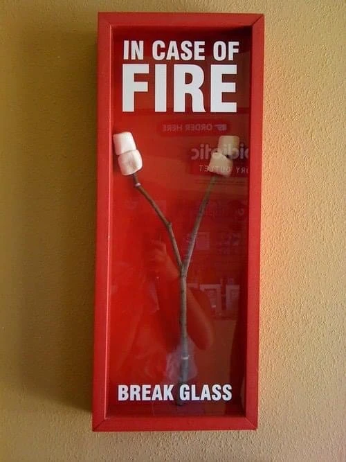 Marshmallow in fire box meme - in case of fire break glass