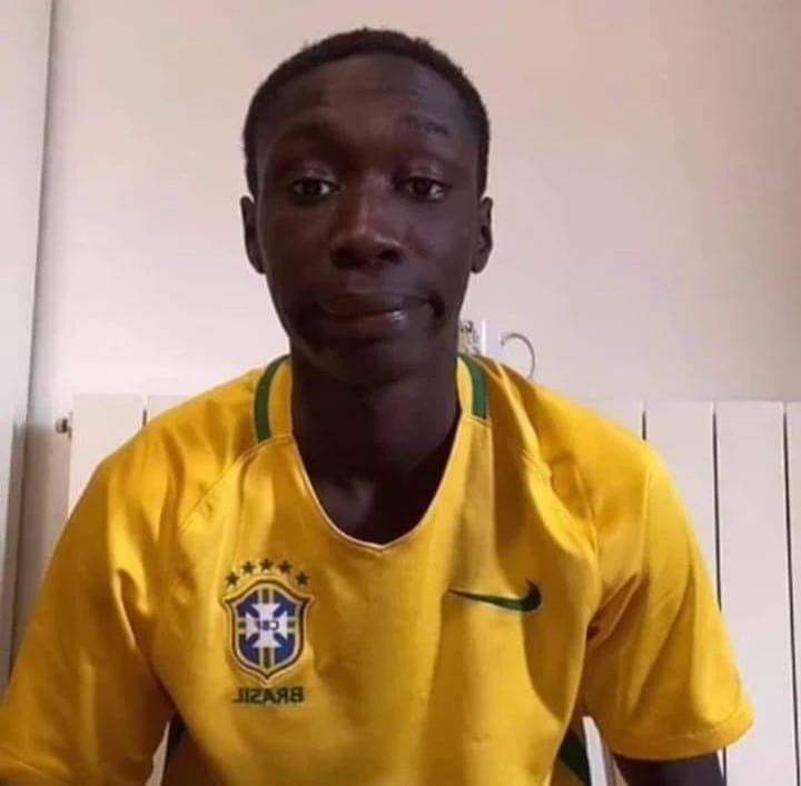 Black guy Khaby Lame wearing yellow T-shirt of Brazil football team meme
