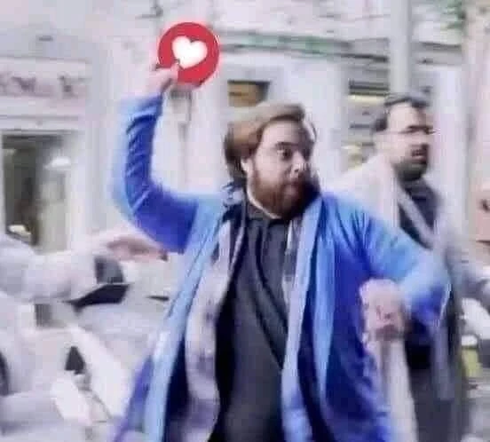 A man throwing heart reaction meme