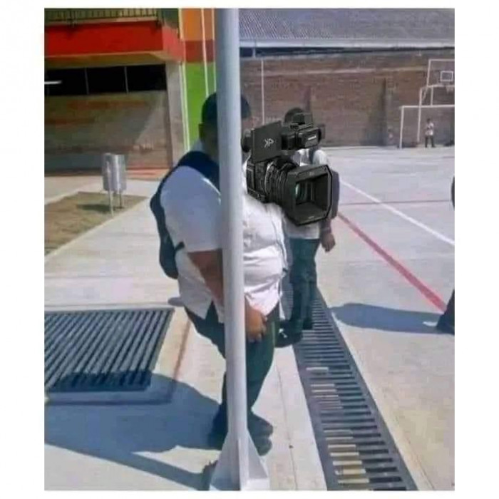 Cameraman with a big camera on the street meme